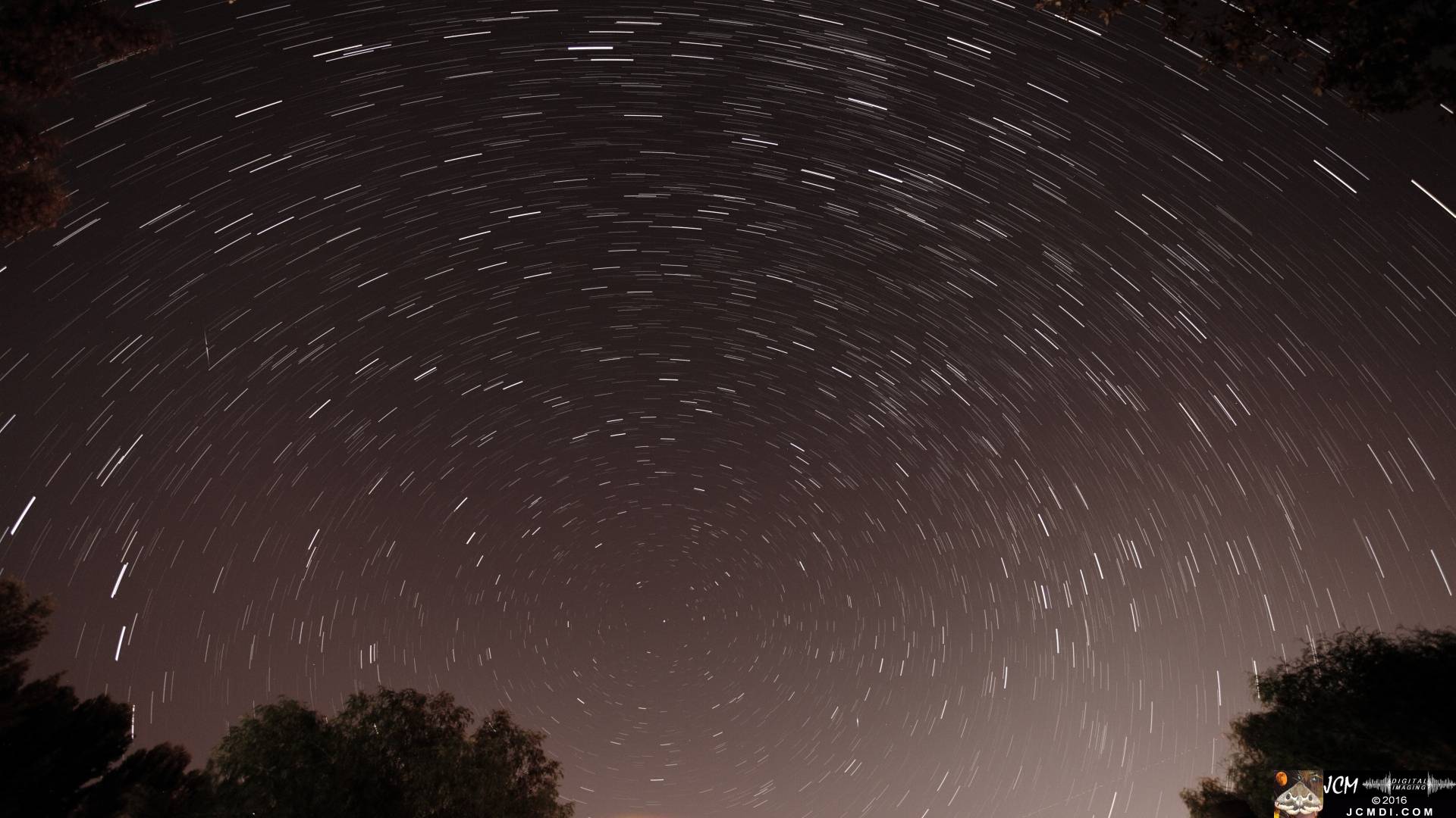 A composite image of long-exposure night sky photos taken during the Perseid Meteor Shower on 8-11-2016 JCMDI.COM